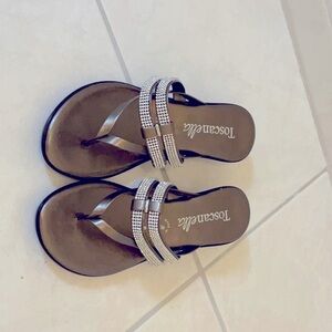 These toscanella  psandals are new and a size six